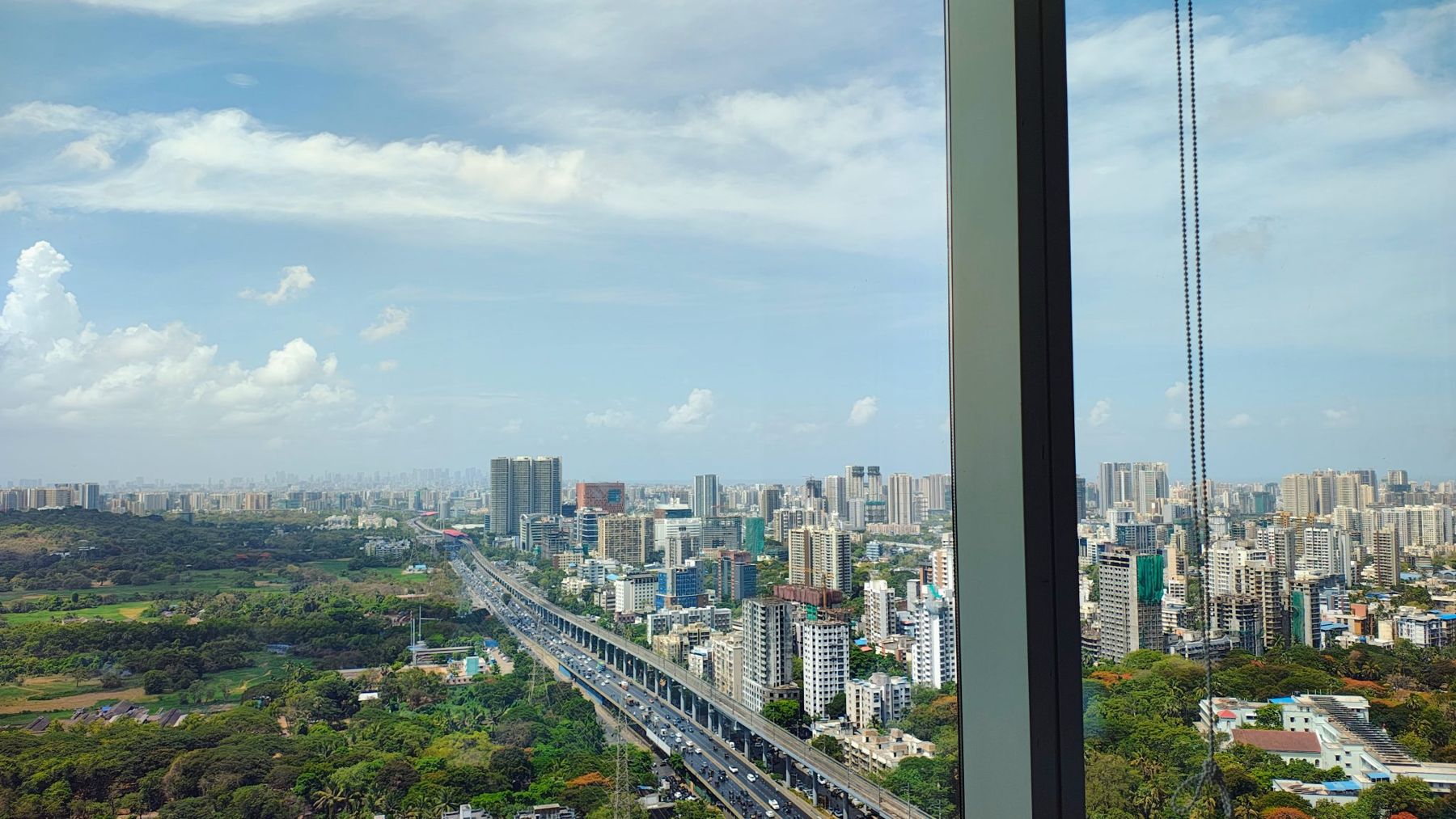 City skyline seen from a high-rise apartment window
